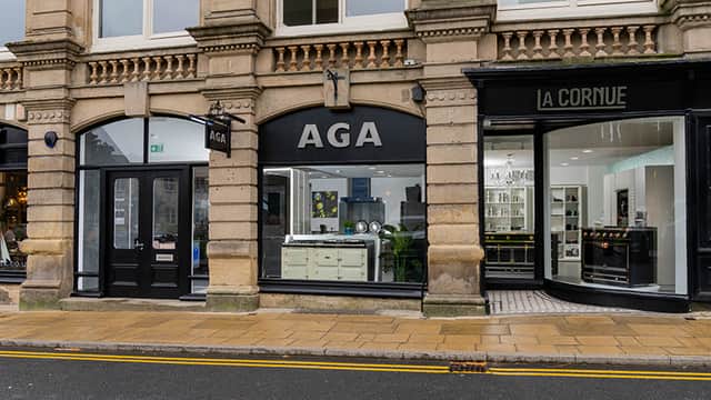 Elegant storefront featuring "AGA" and "La Cornue" signs, large windows showcasing homeware displays in Harrogate.