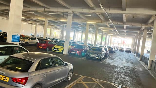 Civic Quarter car park in Doncaster, featuring multiple parked cars under a spacious, well-lit structure.