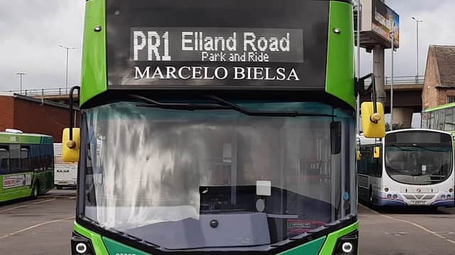 Green double-decker bus displaying "PR1 Elland Road Park and Ride" and "Marcelo Bielsa" parked in Hunslet.