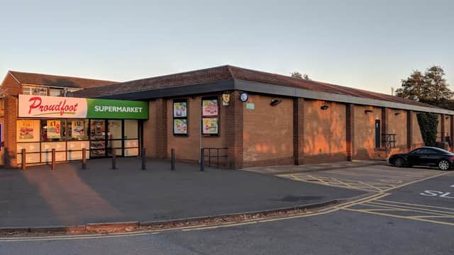 Proudfoot supermarket in Eastfield, North Yorkshire, with a brick exterior, large glass entrance, and parking area.