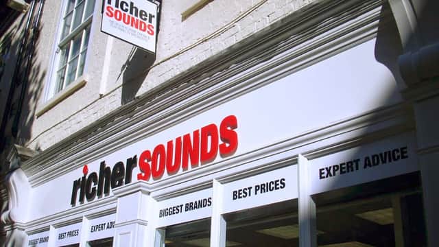 Richer Sounds storefront in York, featuring a prominent sign and windows displaying "Best Prices" and "Expert Advice."