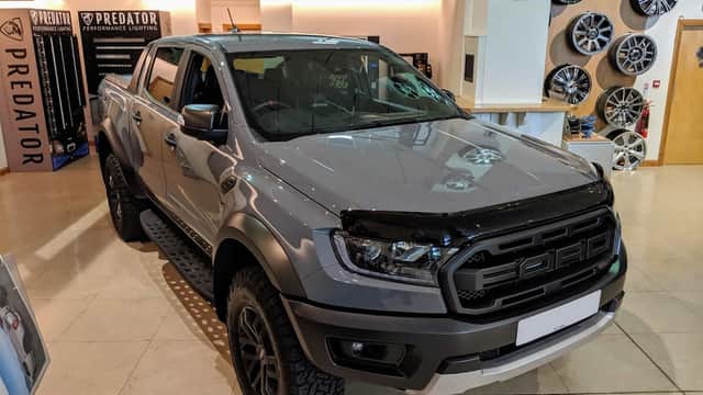 Gray Ford Ranger truck parked inside a shop showcasing wheels and accessories in Leeming Bar, Yorkshire.