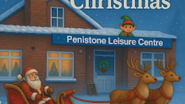 Santa in a sleigh with reindeer outside Penistone Leisure Centre, decorated for Christmas with snow and an elf.