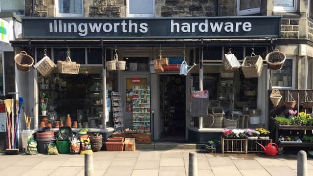 Front of Illingworths Hardware with baskets, pots, and plants outside a stone building in Harrogate, Yorkshire.