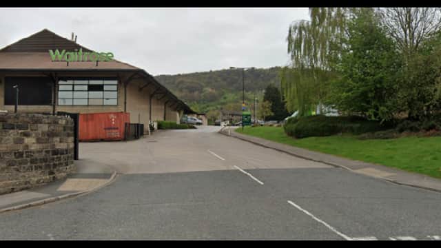 Pay & Display parking area near Waitrose, with trees and hills in the background, in Otley, Yorkshire.