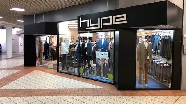 Department store "Hype" in Wakefield featuring formal wear displayed in large front windows.