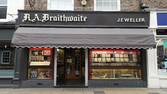 Storefront of R.A. Braithwaite Jewellers in York, featuring displays of jewelry and a "SALE" sign in the windows.