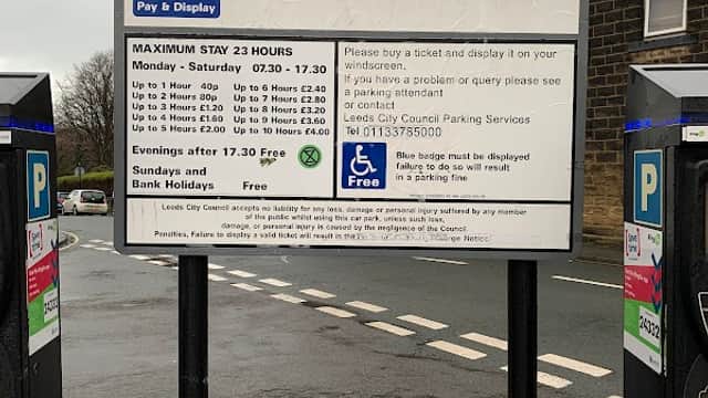 Pay and display parking sign with payment details and maximum stay information in Otley, Yorkshire.