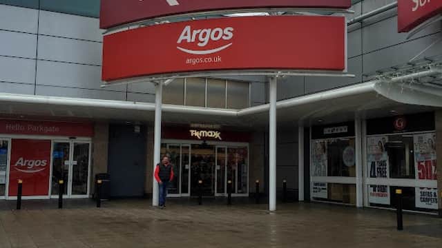 Storefront of Rotherham Parkgate Argos with red signage, located in a shopping area with tiled pavement.