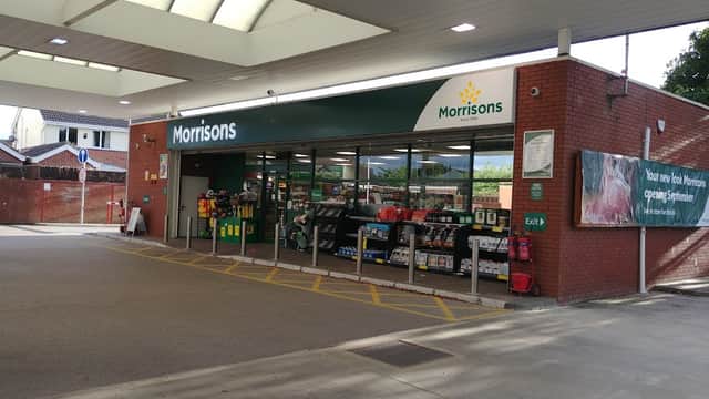 Morrisons store exterior in Brough, Yorkshire, featuring large windows and a green and white sign.