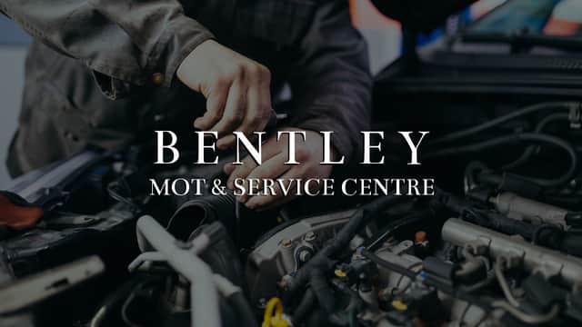 Hands working on a car engine with "BENTLEY MOT & SERVICE CENTRE" prominently displayed.