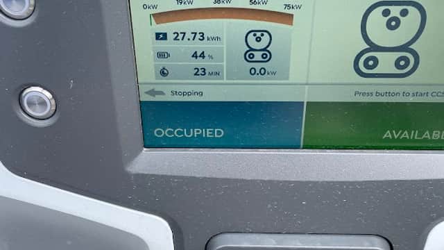 Zest Charging Station display showing charging status, power levels, and time remaining for an electric vehicle.