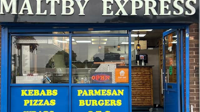 Signage for "Maltby Express" restaurant featuring kebabs, pizzas, wraps, burgers, and Parmesan dishes.