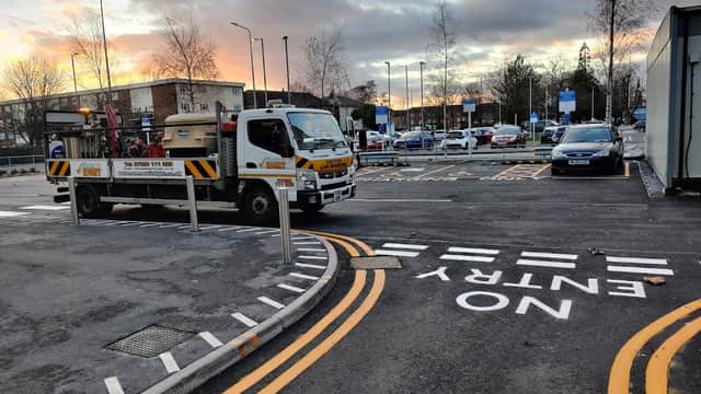 Mark it Right Ltd car park in Aldbrough, Yorkshire, featuring a truck and marked parking spaces at sunset.