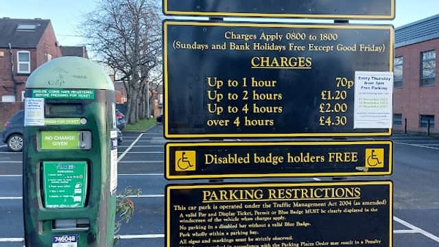 Welcome sign for Newgate South Car Park in Pontefract, featuring parking charges and a pay & display machine.