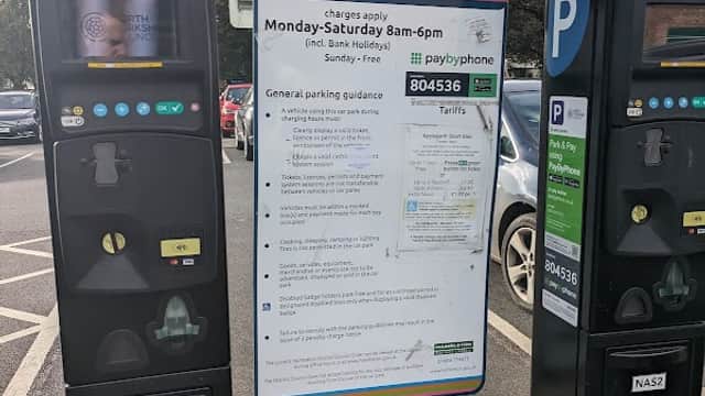 Pay & Display parking machines at Applegarth Short Stay Car Park, Northallerton, with parking guidance sign.