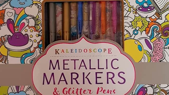 Coloring kit box featuring metallic markers and glitter pens, with colorful illustrations and a label detailing contents.
