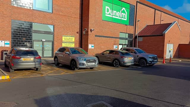 Flemingate Short Stay Click and Collect Car Park with parked cars and Dunelm store in Beverley, Yorkshire.