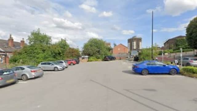 Pay & Display parking lot at 3 Shipton St, Neepsend, with several parked cars and a cloudy sky.