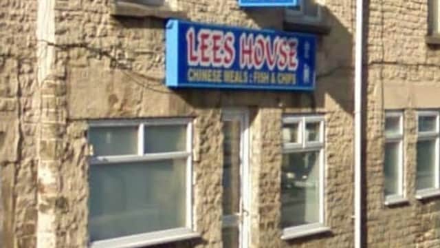 Lee's House restaurant with a blue sign, stone facade, and windows, located on a street in Deepcar, Yorkshire.