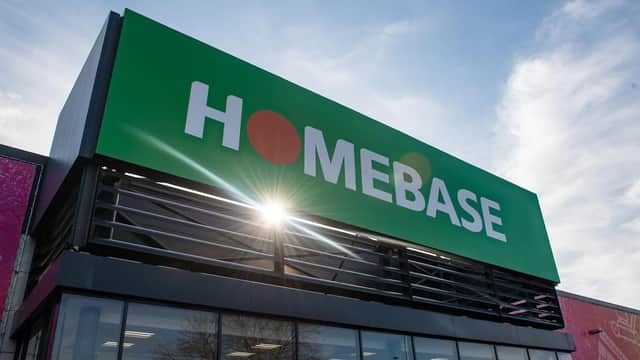 Bright green Homebase sign with a red dot, showcasing a sunny day at the Garden Centre in Selby, North Yorkshire.