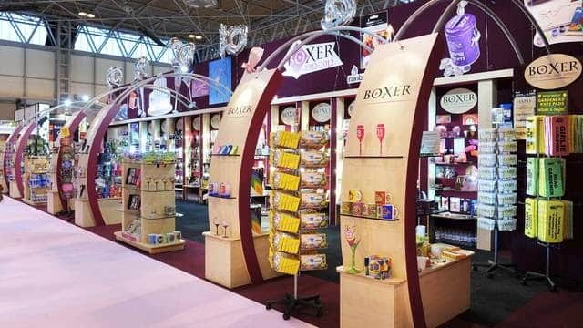 Colorful book displays and shelves in a vibrant bookshop setting, featuring various titles and merchandise.
