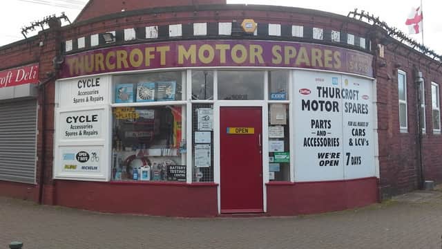 Thurcroft Motor Spares storefront featuring "OPEN" sign, cycle accessories, and various car parts displayed.