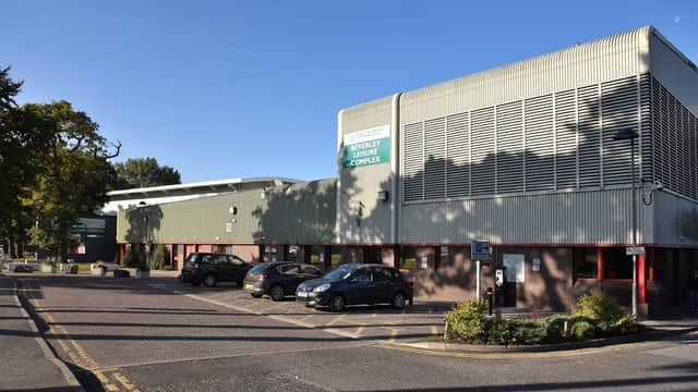 Leisure complex building with modern architecture, parking area, and greenery in Beverley, Yorkshire.