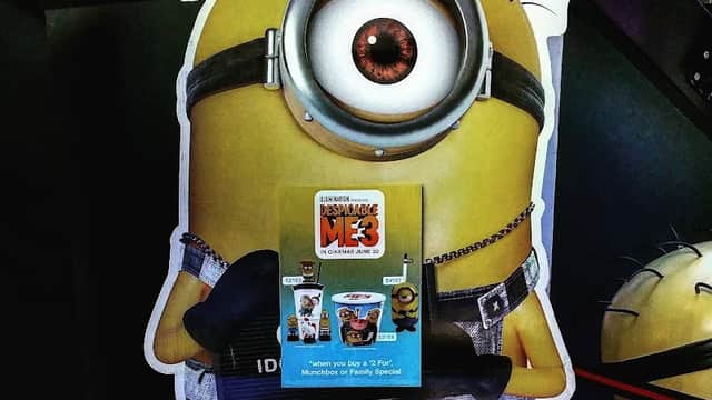 Minion character holding a promotional sign for "Despicable Me 3" at Valley Centertainment in Carbrook, Yorkshire.