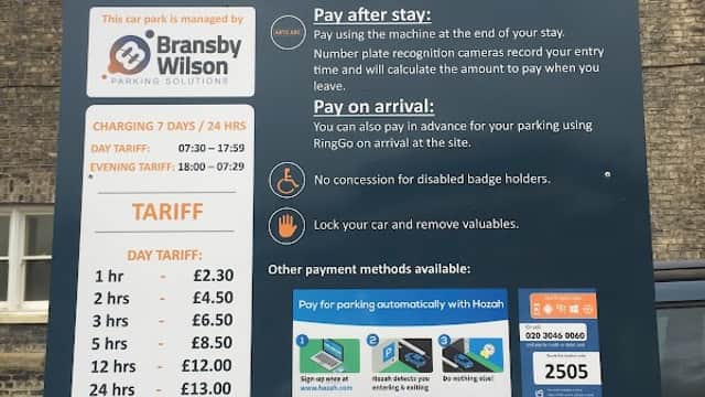 Sign for Peel Street Car Park in York, detailing parking charges, payment methods, and contact information.