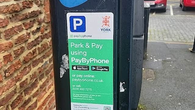 Parking meter with "P" sign and payment instructions for Bootham Row Car Park in York, Yorkshire.