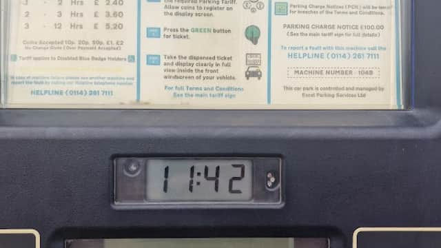 Parking machine displaying rates, instructions, and time at Providence Street Car Park in Wakefield, Yorkshire.