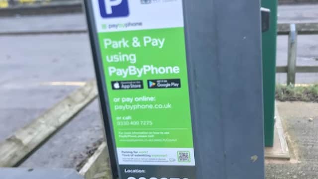 PayByPhone parking sign at Burley Road Car Park, Leeds, displaying parking instructions and location code.