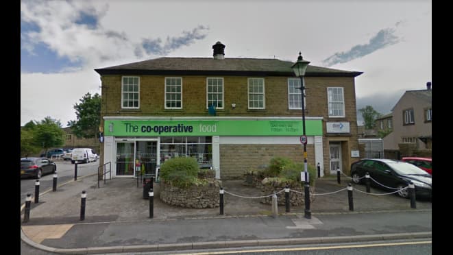 Co-operative Food store in Gargrave, Yorkshire, with a Pay & Display parking area and lampposts in view.