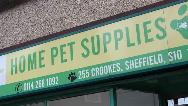 Green sign with "HOME PET SUPPLIES" and contact details, located at 255 Crookes, Sheffield, Yorkshire.