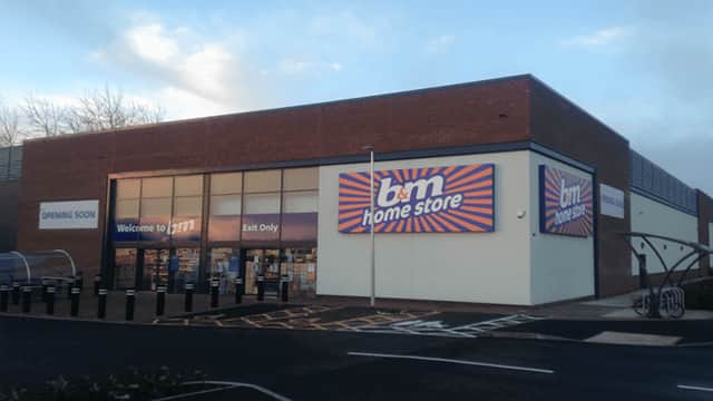 B&M Home Store exterior with large colorful signage, entrance, and parking area in Catterick Garrison, Yorkshire.