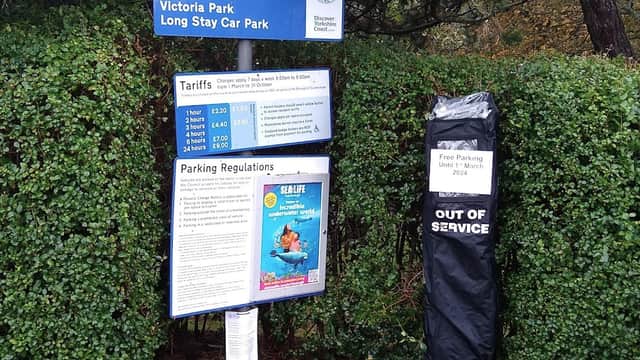 Welcome sign for Victoria Park Long Stay Car Park, with tariff details and a notice for out-of-service payment machine.