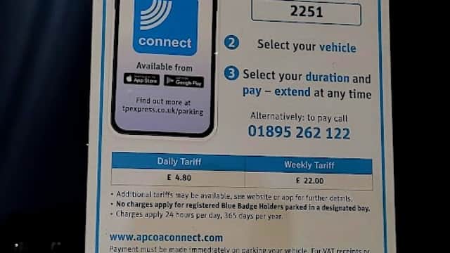 Pay & Display sign for Car Park Brough with instructions for using the APCOA Connect app and contact information.