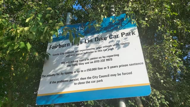 Sign for Fairburn Ings Newton Lane Parking, warning about tipping issues and potential closure by the City Council.