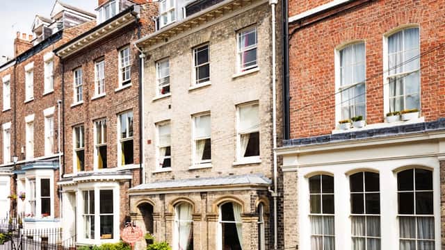 Victorian-style guest house with brick facade, inviting entrance, and decorative windows in York, Yorkshire.