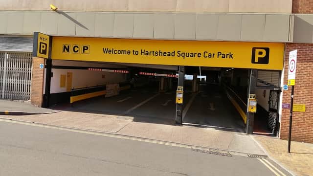 NCP Hartshead Square Car Park entrance with yellow signage and payment machines visible.