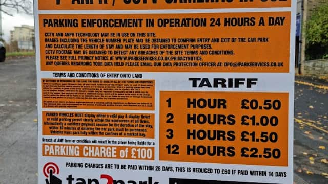 Welcome sign for Parkgate Car Park in Bradford, detailing parking fees, payment options, and enforcement information.
