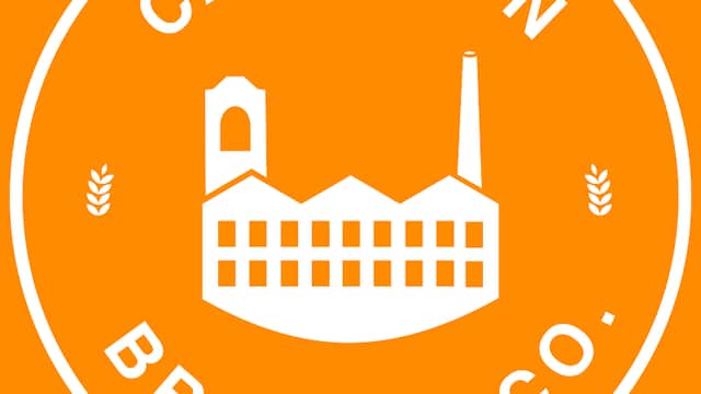 Carleton Brewing Company logo featuring a white factory silhouette on an orange background with decorative elements.