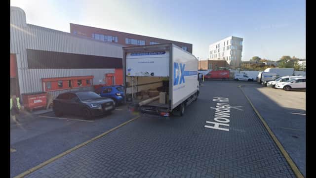Pay & Display parking area in Attercliffe, Yorkshire, with a delivery truck and several parked vehicles.