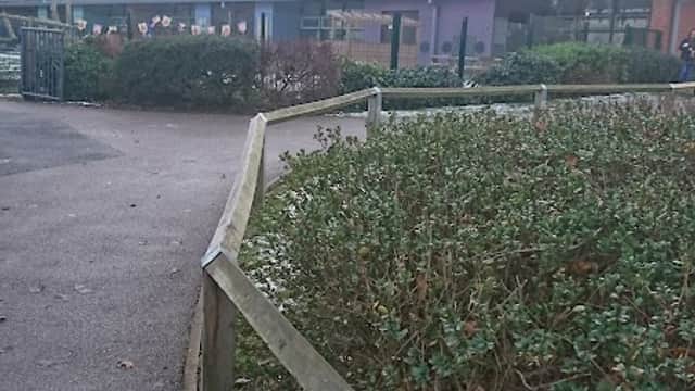 Wombwell Park Street Primary School with a modern building, pathway, and surrounding greenery in Wombwell, Yorkshire.