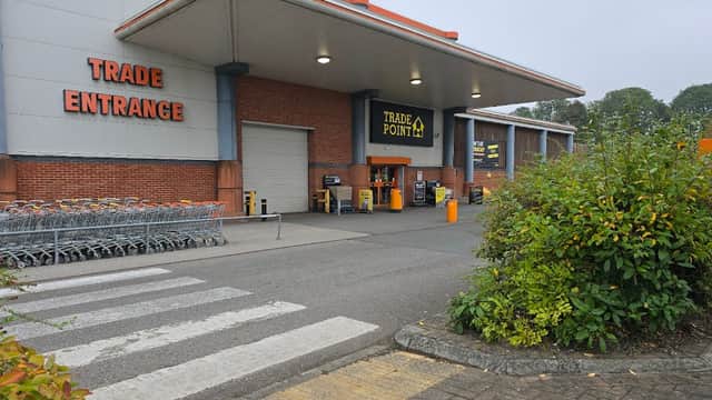 TradePoint York entrance with shopping carts, signage, and a landscaped area in front.