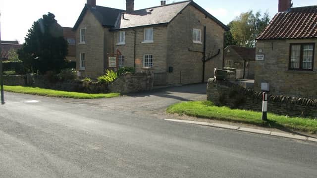 Charming stone house with a garden, located at a rural intersection in Ebberston, Yorkshire.