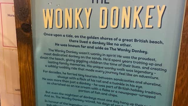 Sign displaying "The Tale of The Wonky Donkey" at the Wonky Donkey pub in Skirlington, Yorkshire.