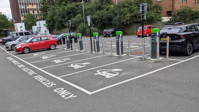 Buxton Street Car Park featuring electric vehicle charging stations and parked cars in a well-maintained area.