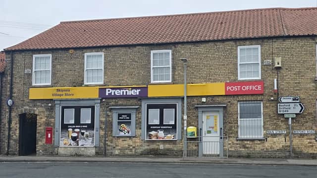 Premier Village Store with yellow signage, Post Office, and food displays, set in a brick building in Skipsea, Yorkshire.